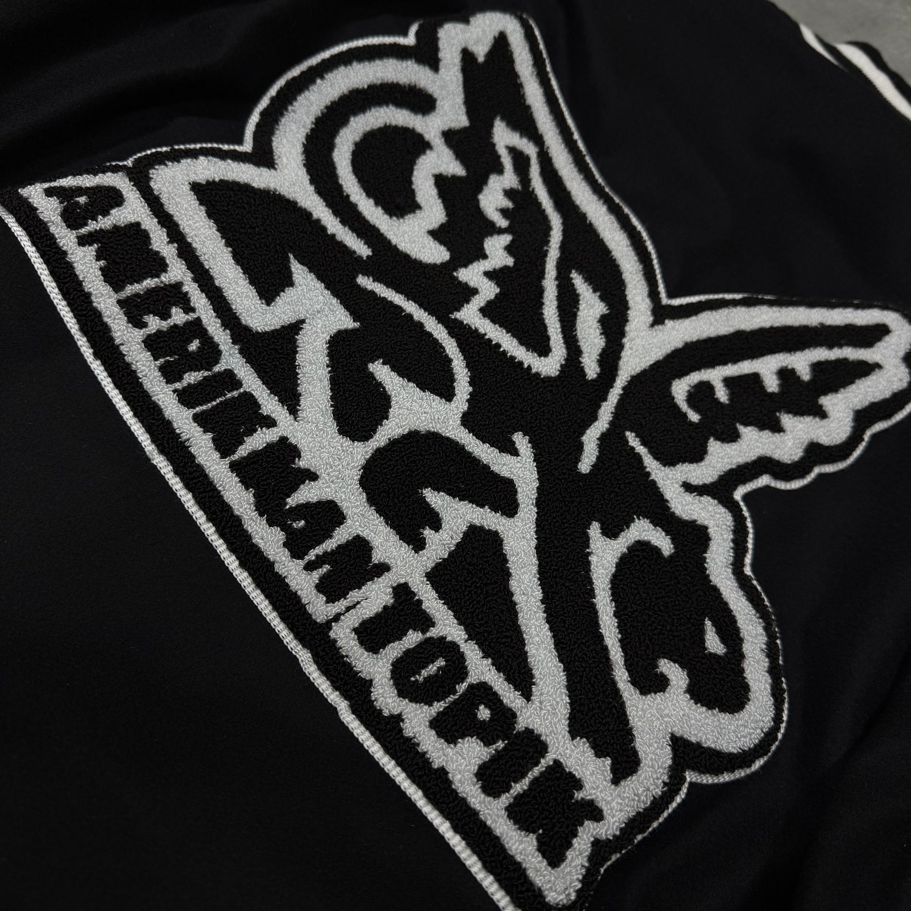 It's Who I'am Varsity Jacket — Black