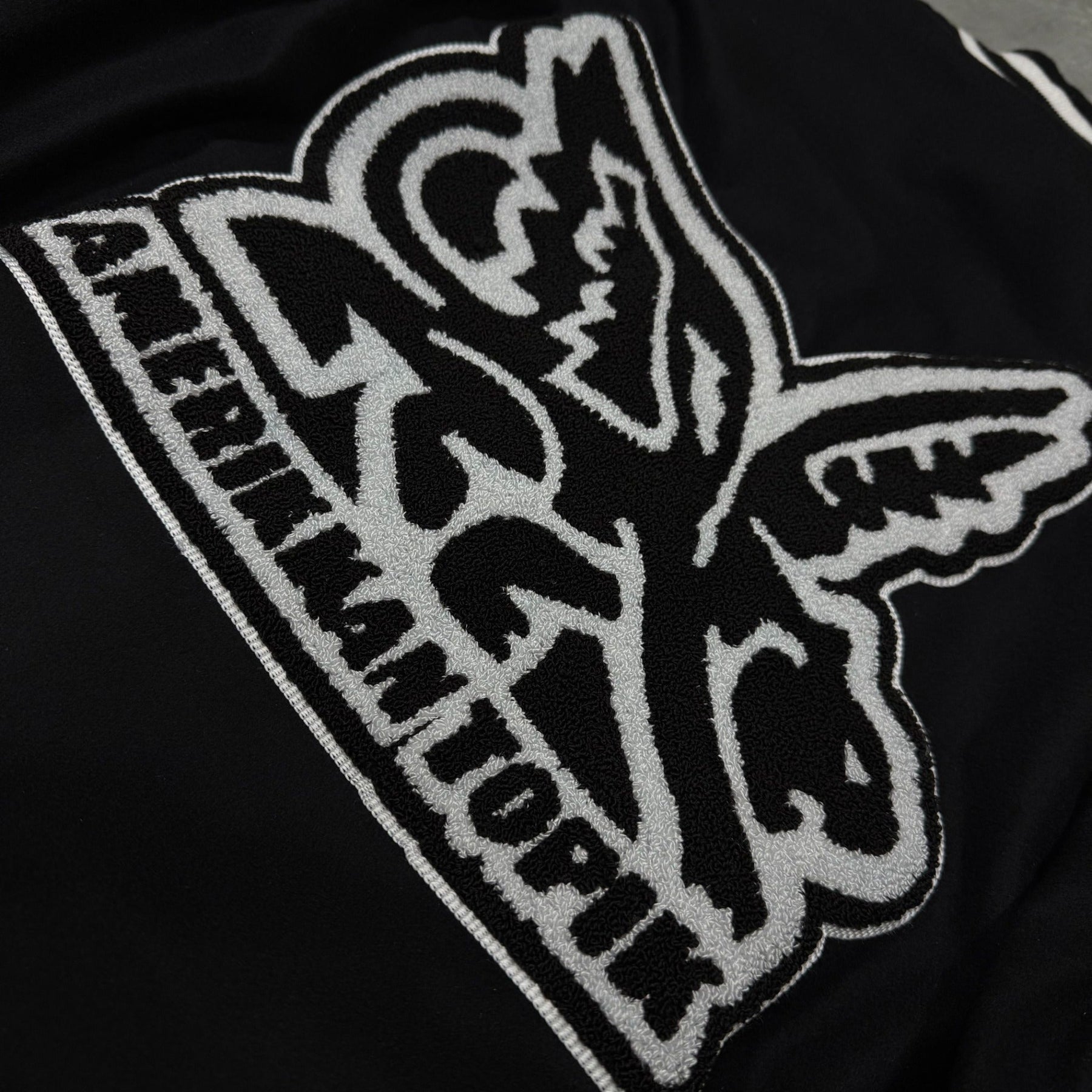 It's Who I'am Varsity Jacket — Black